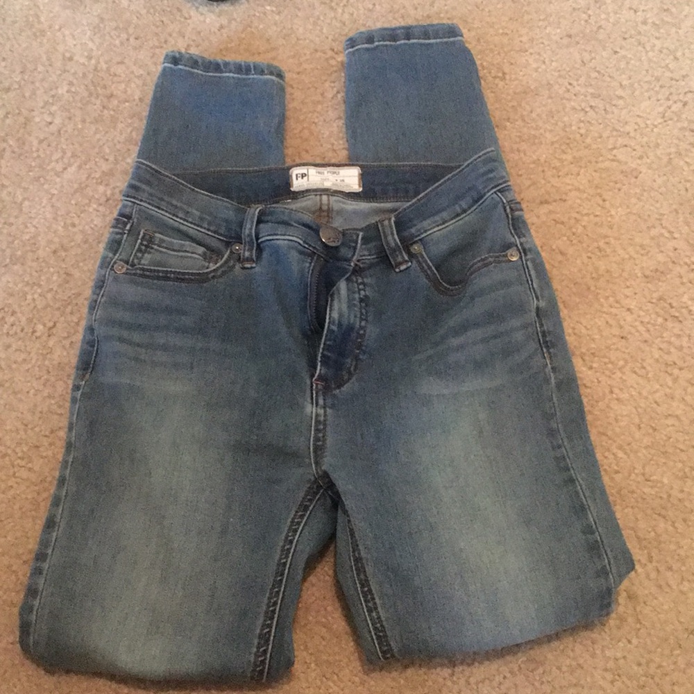 Midrise medium to light wash skinny jeans